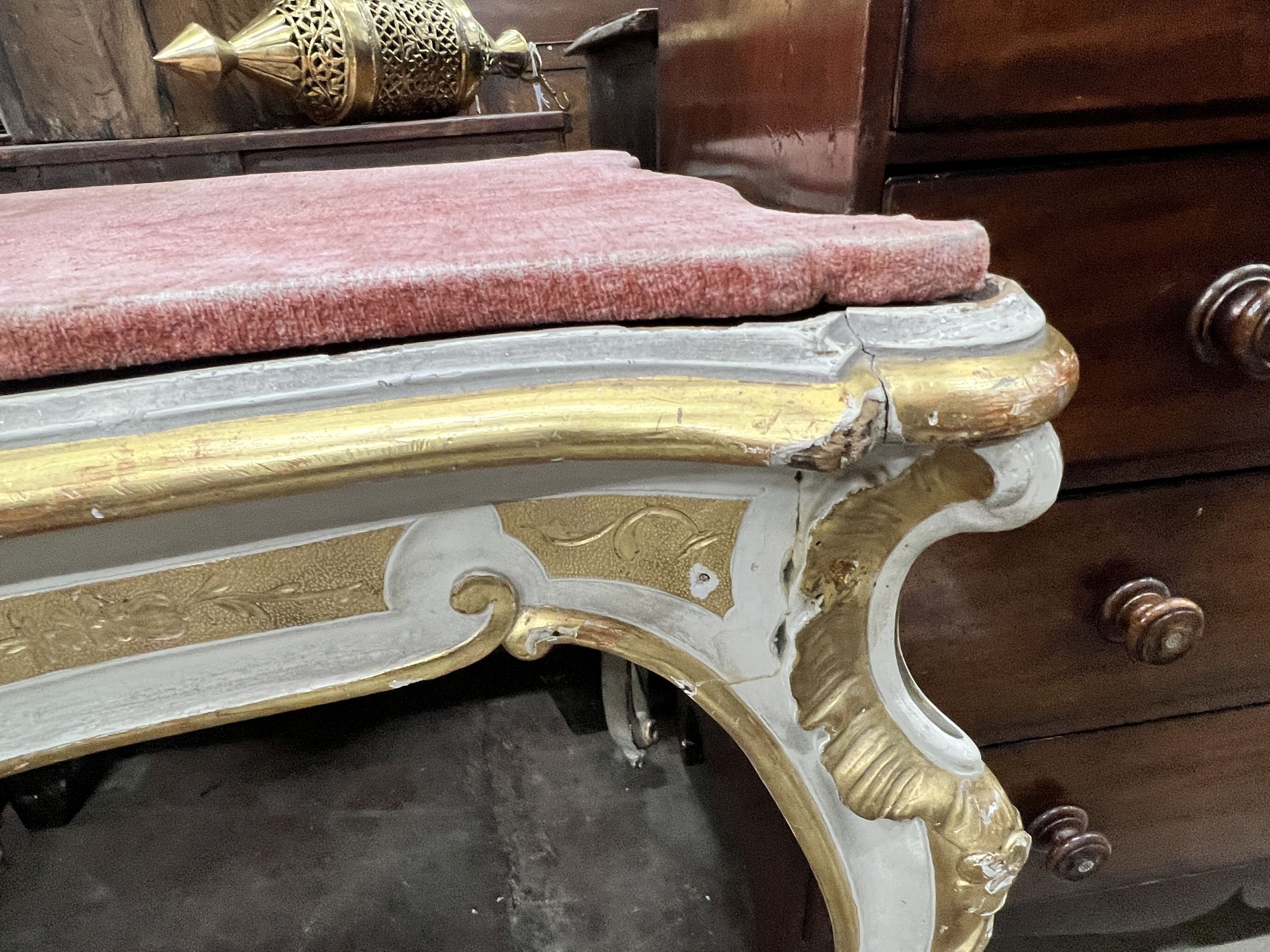 An Italian painted parcel gilt centre table, width 105cm, depth 68cm, height 86cm